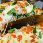 white stuffed roman pizza with pork & rabe