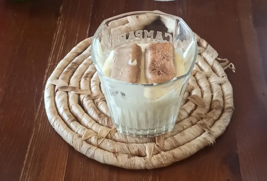 tiramisu cup recipe-a tiramisu cup with 2 layers of savoiardi biscuits and cream
