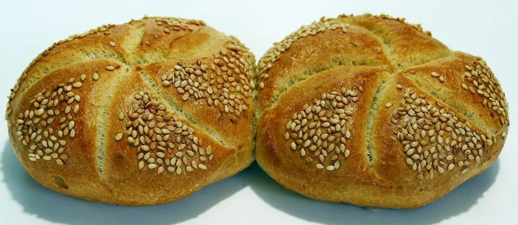 2 buns of kaiser rolls, another good bread for pulled pork