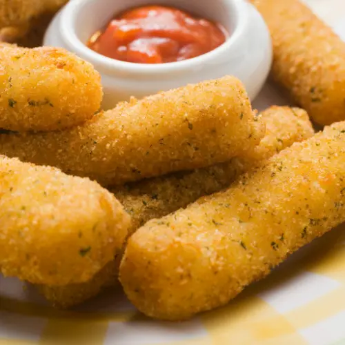 my reheated mozzarella sticks along with some dipping sauce