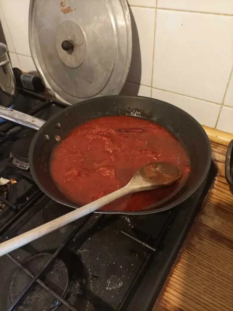 making homemade amatriciana sauce