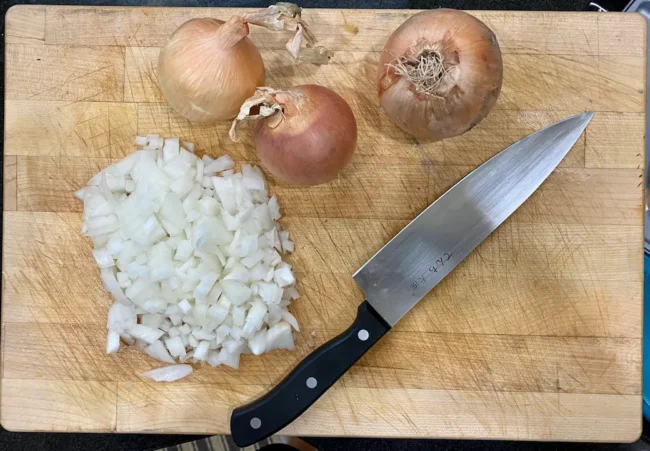 how to saute onions and garlic-white onions on a working surface