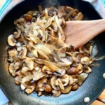 sauteed mushrooms and onions in a saucepan, ready to be used for a juicy burger