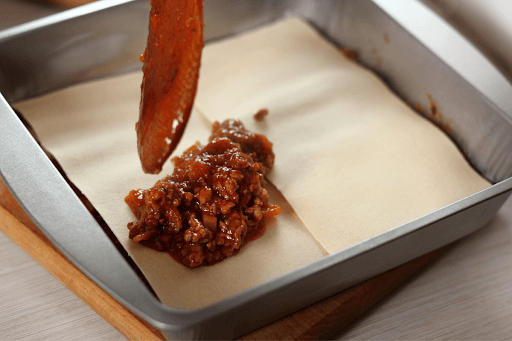 Assemble lasagne layers for recipe