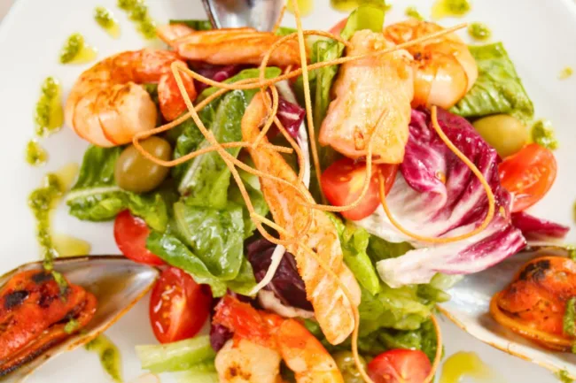Seafood side dishes for thanksgiving-Roasted vegetables served with shrimp on a platter