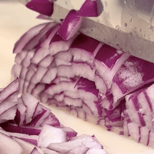 Cut onion prepared for fridge storage after cooking