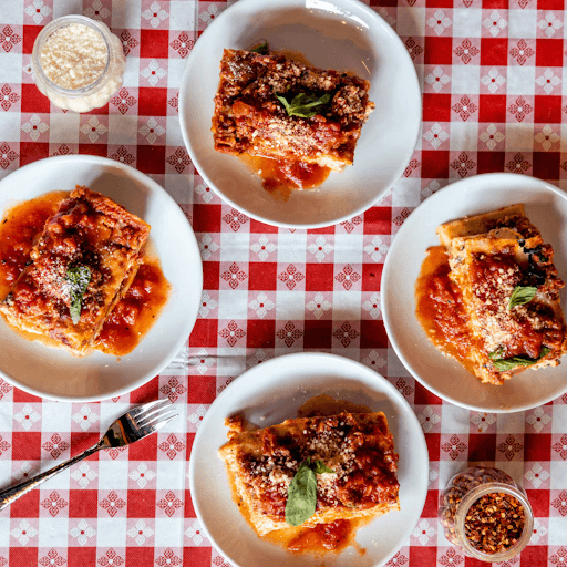 Slice of lasagna showing layered pasta and sauce